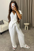 Anny White Short Sleeve V Neck Plunge Belted Jumpsuit